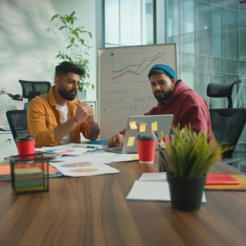 Business,Negotiation,In,Informal,Office,Two,Happy,Smiling,Talking,Hindu